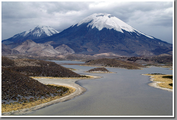 Volcanos Parinacota and Pomerape above Lagunas Cotacotani, Altiplano, Chile