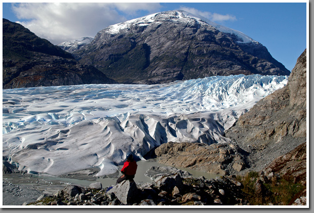 Rianna Riegelman looking down on an unnamed HPN1 glacier (Ventisquero Hielo Patagonico Norte 1), Northern Patagonian Ice Field, Aysen, Patagonia, Chile