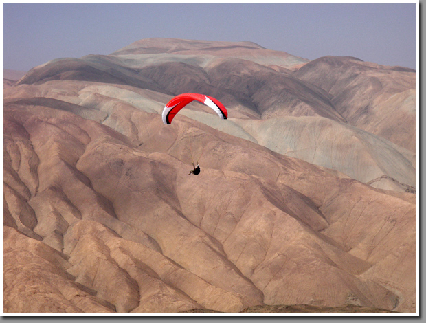 Carlos Curi paragliding at Caleta Colorada, Iquique, The Atacama Desert, Chile