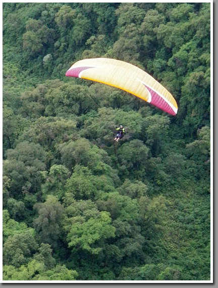 Carlos Curi flying his Niviuk Artik 2 paraglider over Loma Bola, Aconquija Range, Tucuman, Argentina