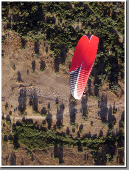 Sebastian Alvarez flying his Niviuk Artik 2 paraglider over Las Vizcachas, Santiago de Chile, Chile