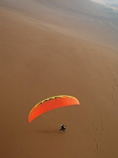 Palo Buque - An acro pilot having fun on a virgin sand slope, Palo Buque, Iquique, The Atacama Desert, Chile