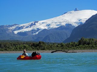 Packrafting Rio Palena - Rivers of Patagonia - Packrafting rio Palena with volcano Melimoyu in the background, Patagonia, Chile